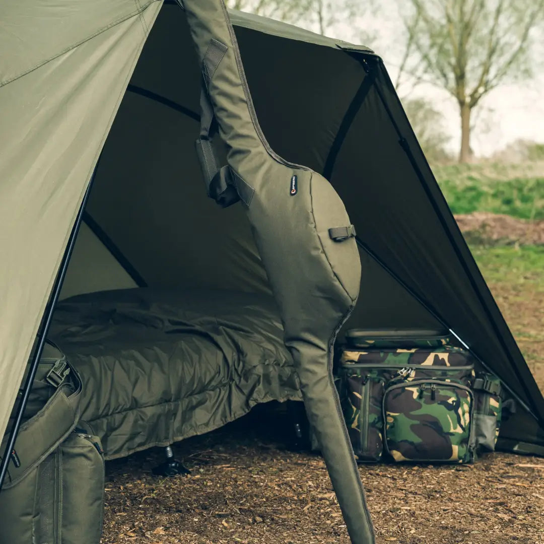 Camping tent showcasing a Speero Adjustable Rod Sleeve with gear and sleeping bag inside