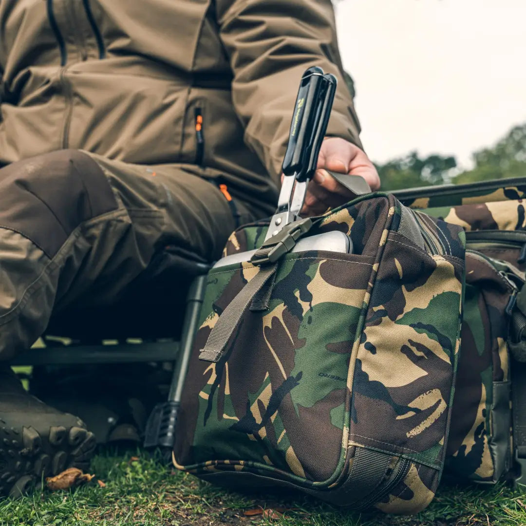 Camouflage backpack with Speero Cutlery Pouch and knife, perfect for outdoor adventures