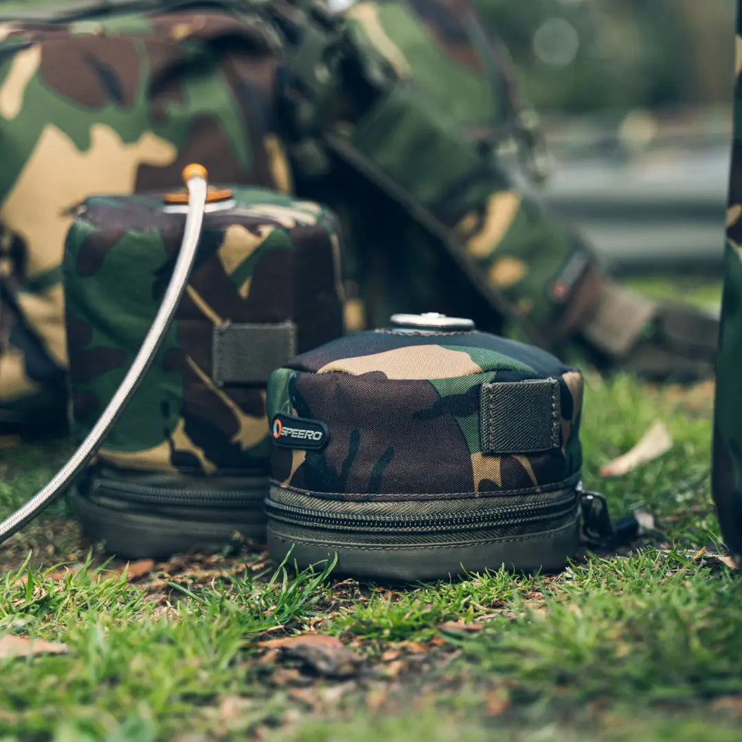 Camouflage military cap with a zippered pouch for the Speero Gas Canister Cover