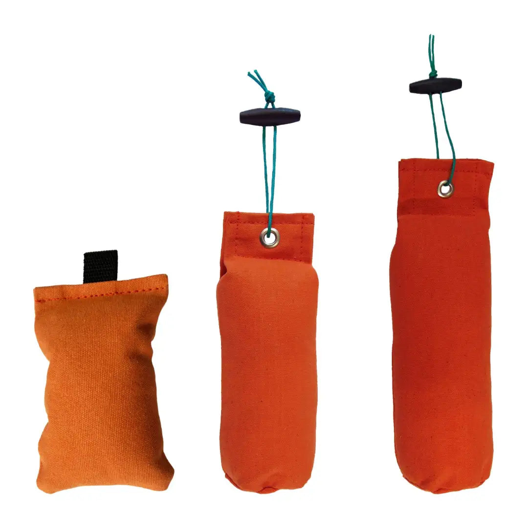 Three orange canvas pouches in various sizes for the Sporting Saint Flight Dummy