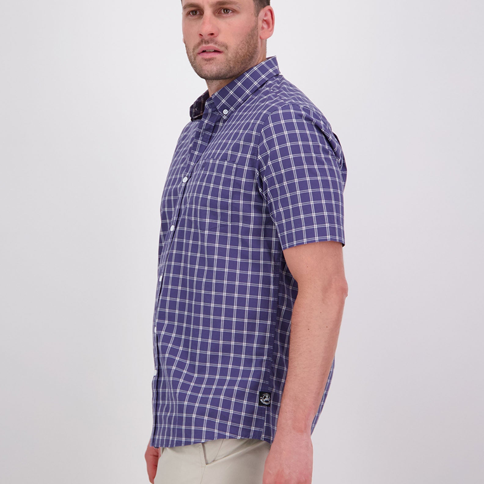 Man in a blue and white checkered short-sleeve shirt for country clothing and outdoors