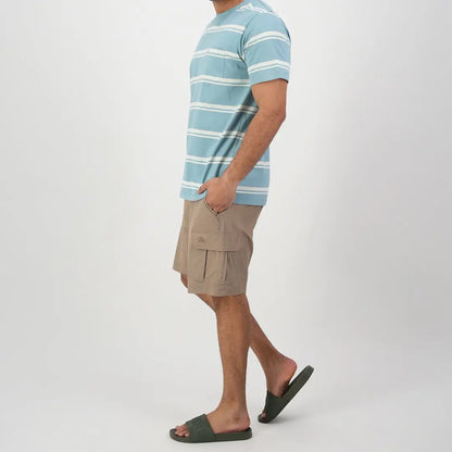 Person in light blue striped t-shirt and khaki shorts, perfect for country clothing outdoors