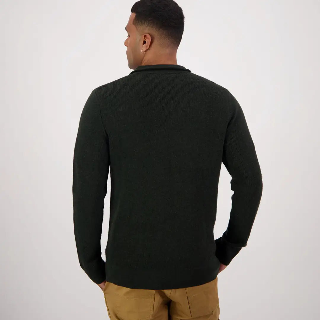 Back view of a person in a dark green Swanndri Otahu River crew neck jumper