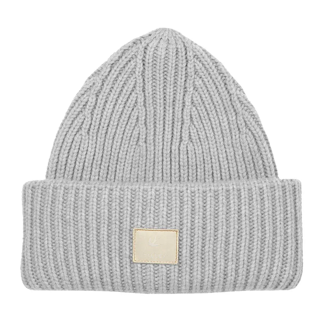 Light gray Tilley Alpine Beanie in merino wool with a folded brim and gold label