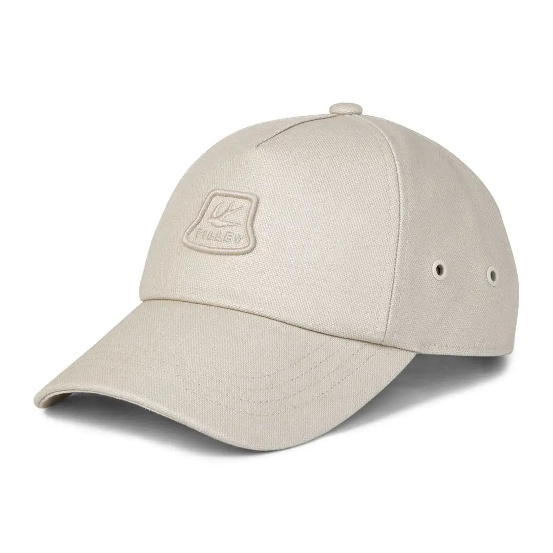 Beige Tilley Heritage Cap with embroidered logo patch on the front