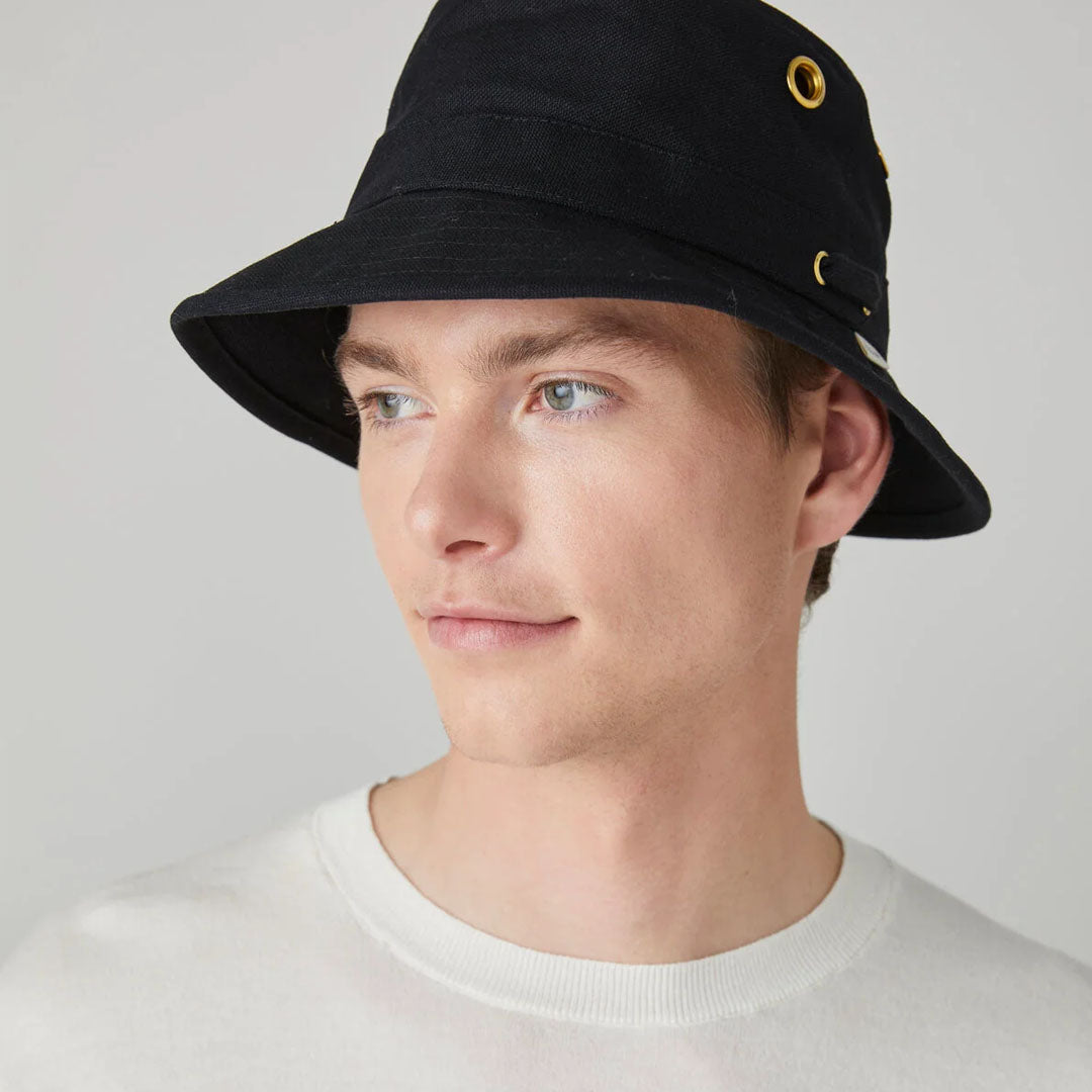 Black Tilley Iconic T1 Bucket Hat with stylish gold grommets for a trendy look