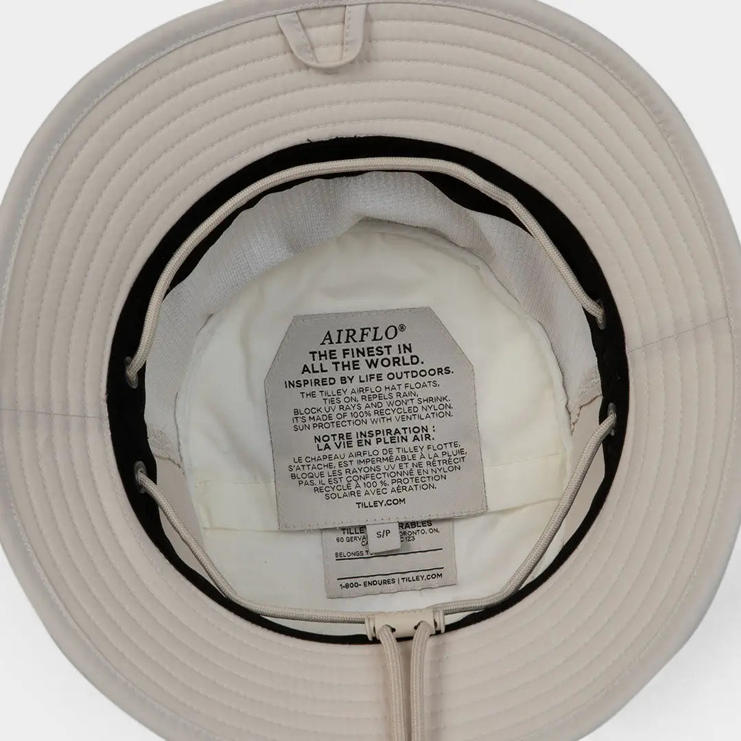 White Tilley LTM1 Airflo Bucket Hat showing care label and airflo mesh panel