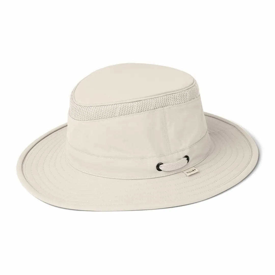 Off-white wide-brimmed Tilley Airflo Hat with mesh band for cool comfort