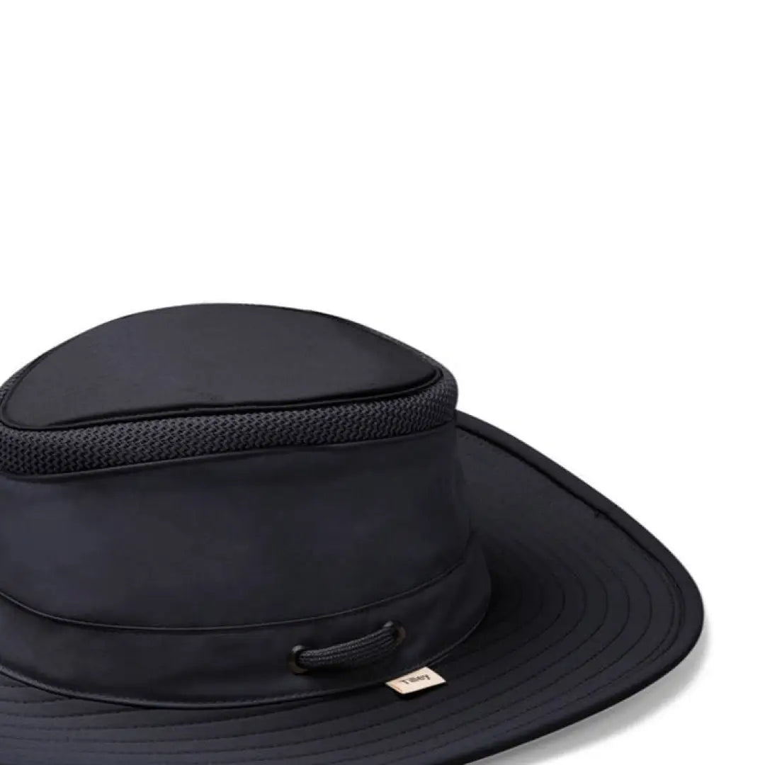 Black wide-brimmed Tilley LTM6 Airflo Hat with a textured band for stylish sun protection