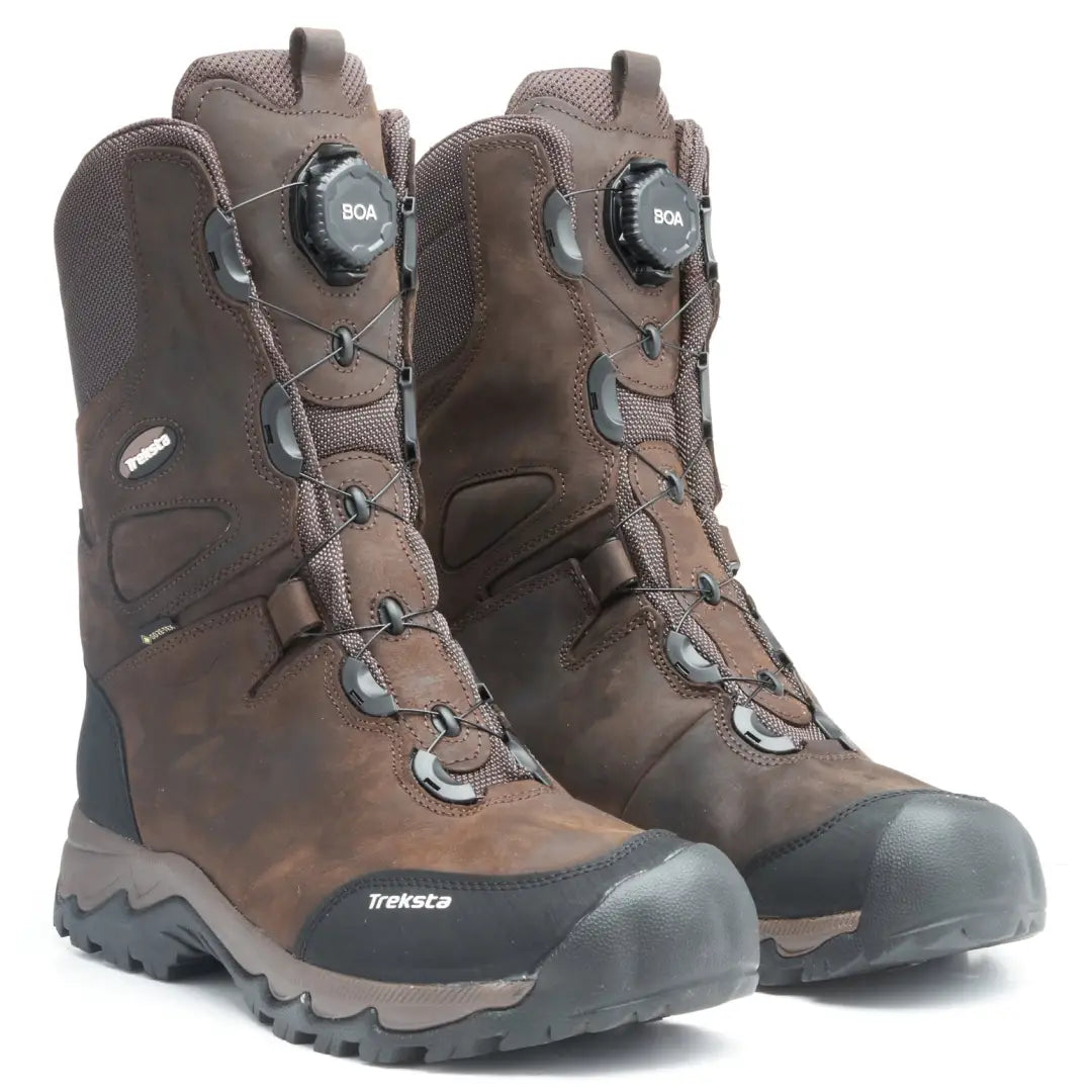 Brown leather hiking boots with rugged soles and Gore-Tex waterproof leather design