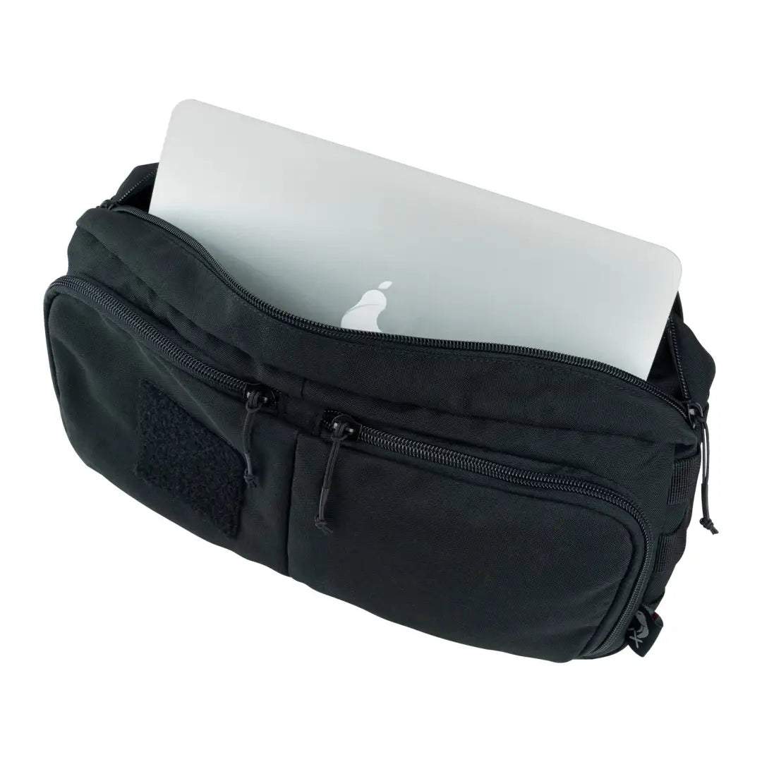 Black Viper VX Buckle Up Sling Pack with a white laptop peeking inside, perfect for active people