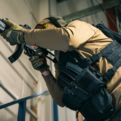 Person in tactical gear aiming an assault rifle with Viper VX Multi Weapon System Set