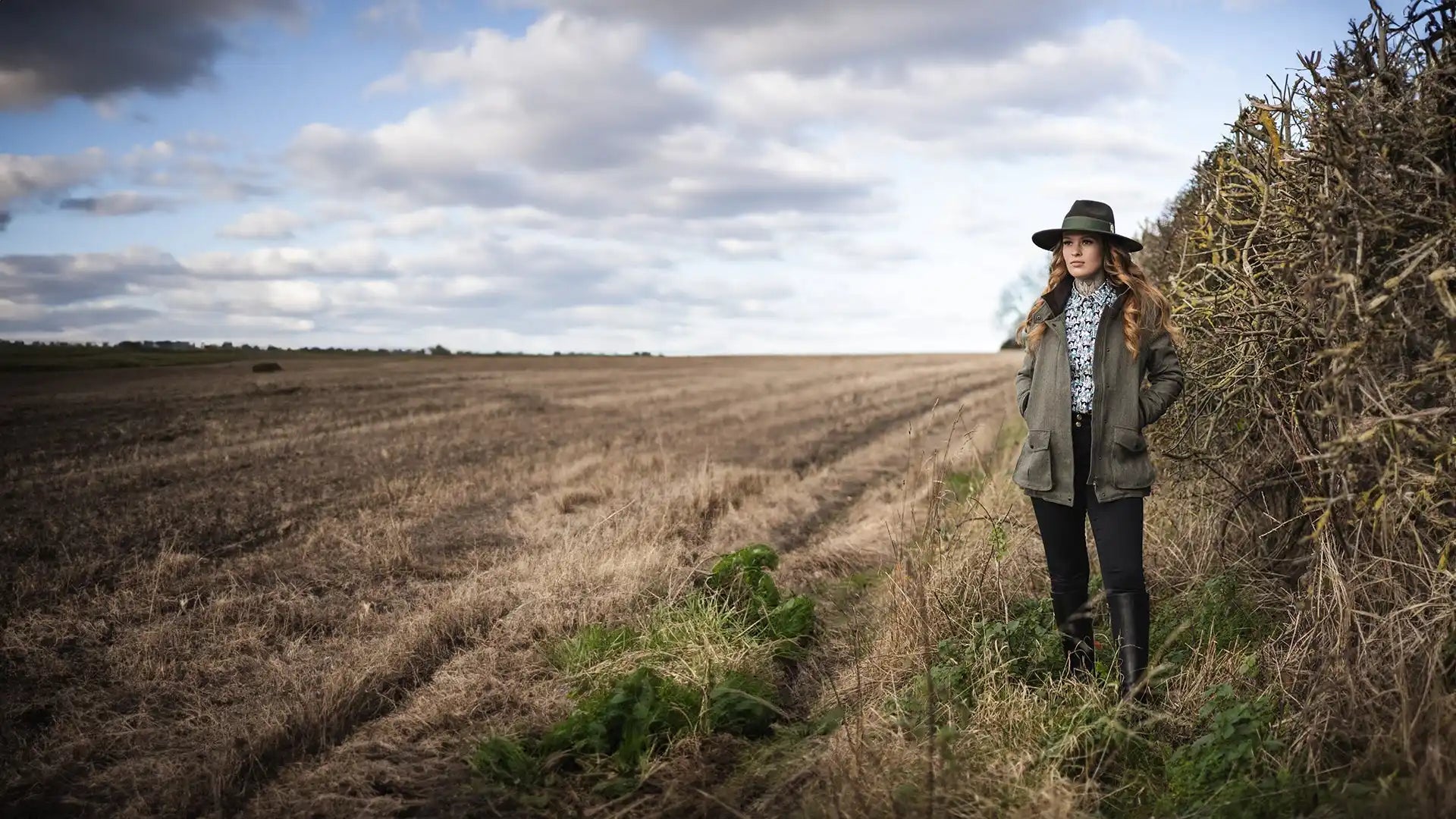 Woman in outdoor attire.